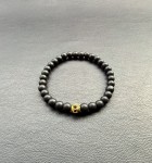 Black obsedian and golden skull.