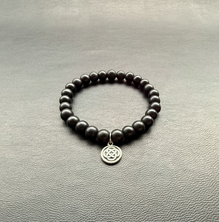 Black obsedian with viking symbol.